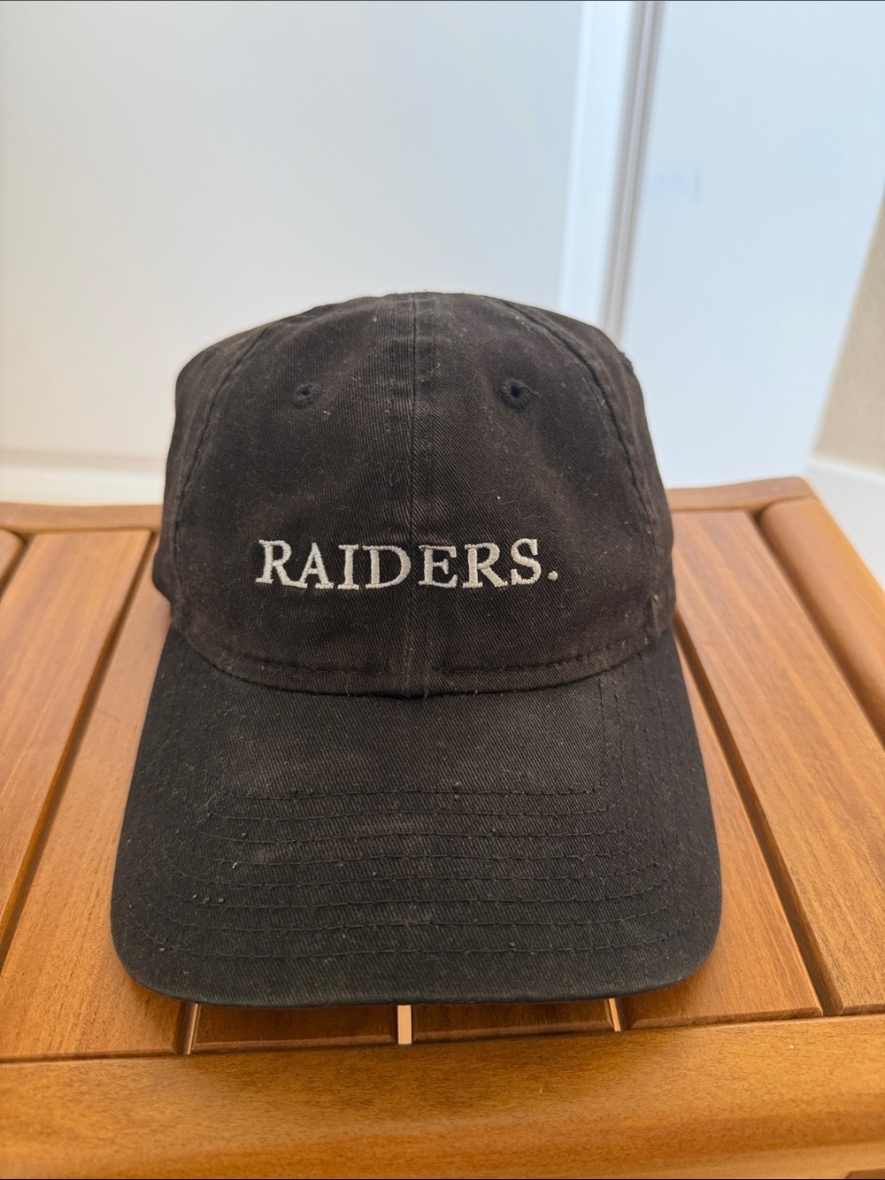 New Era Black Baseball Cap with White Logo Stitching